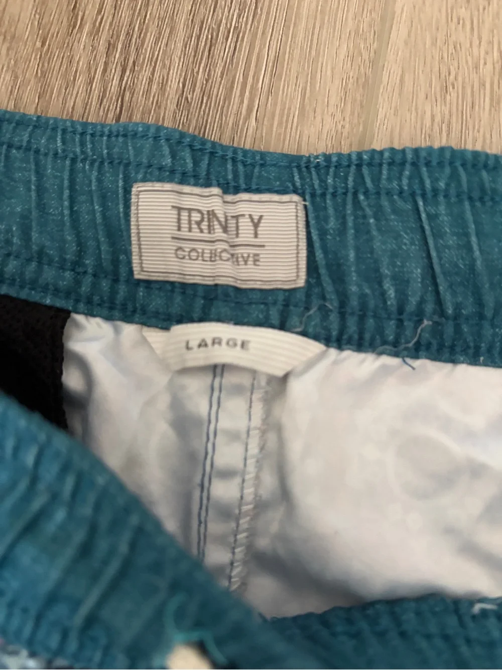Trinity Teal & Red Geometric Medallion Swim Trunks